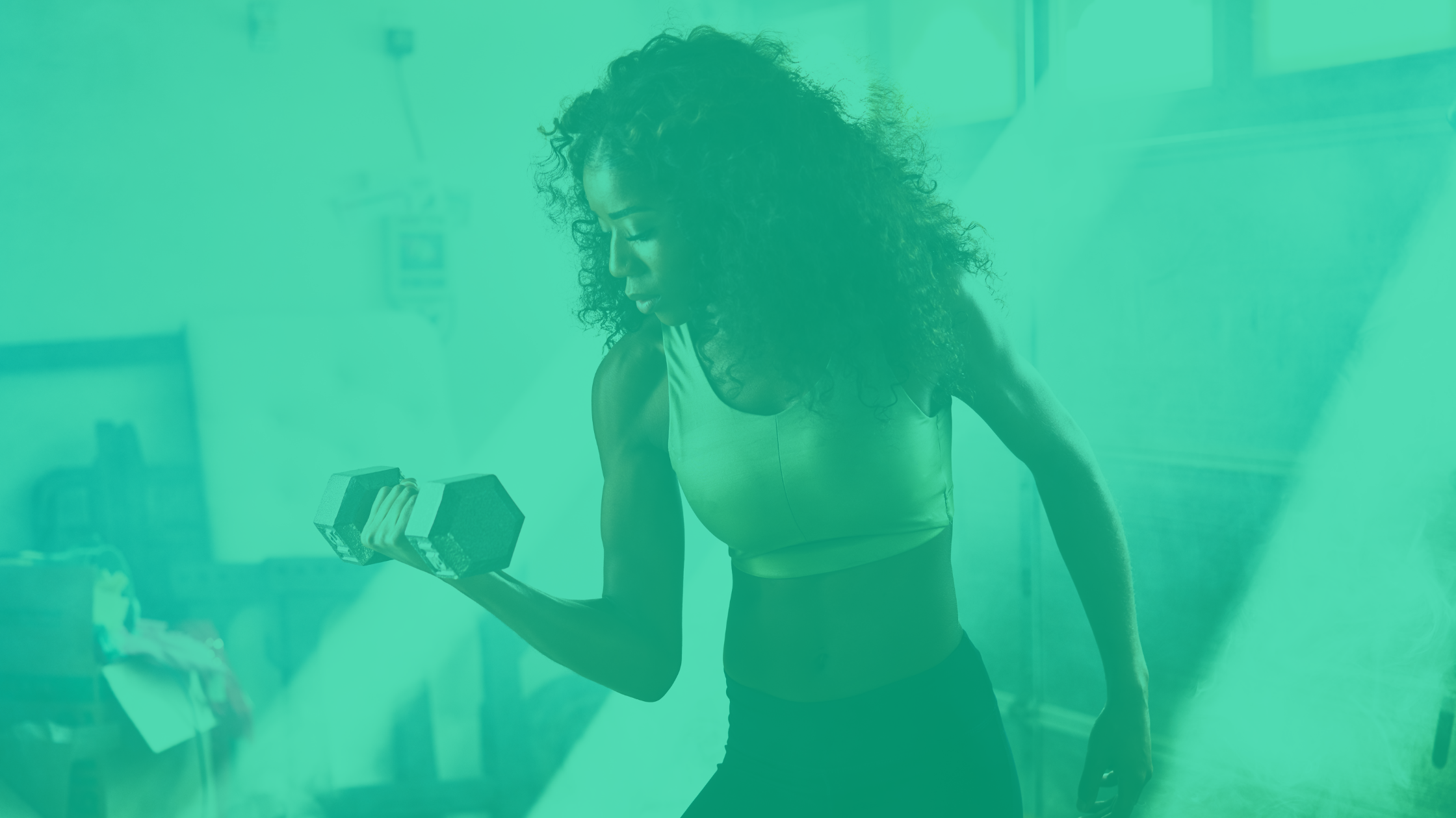 Fit Athletic African American Woman Lifting Weights